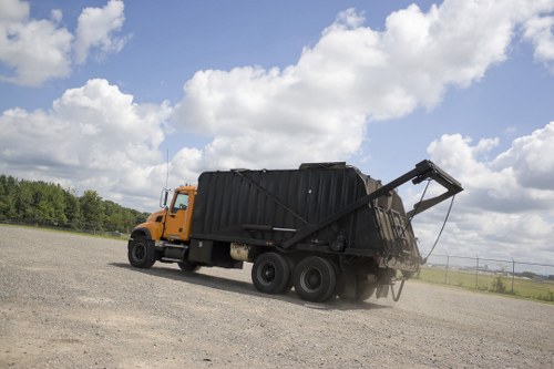 Specialist handling of hazardous waste items during collection
